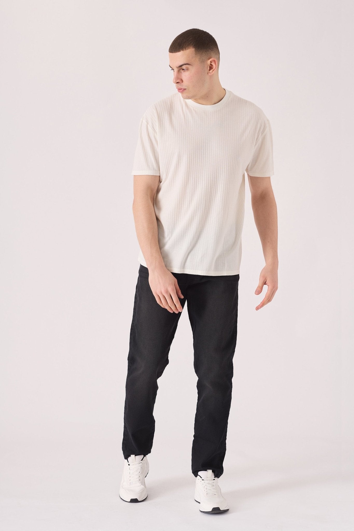 black washed jeans slim fit side view full length leg