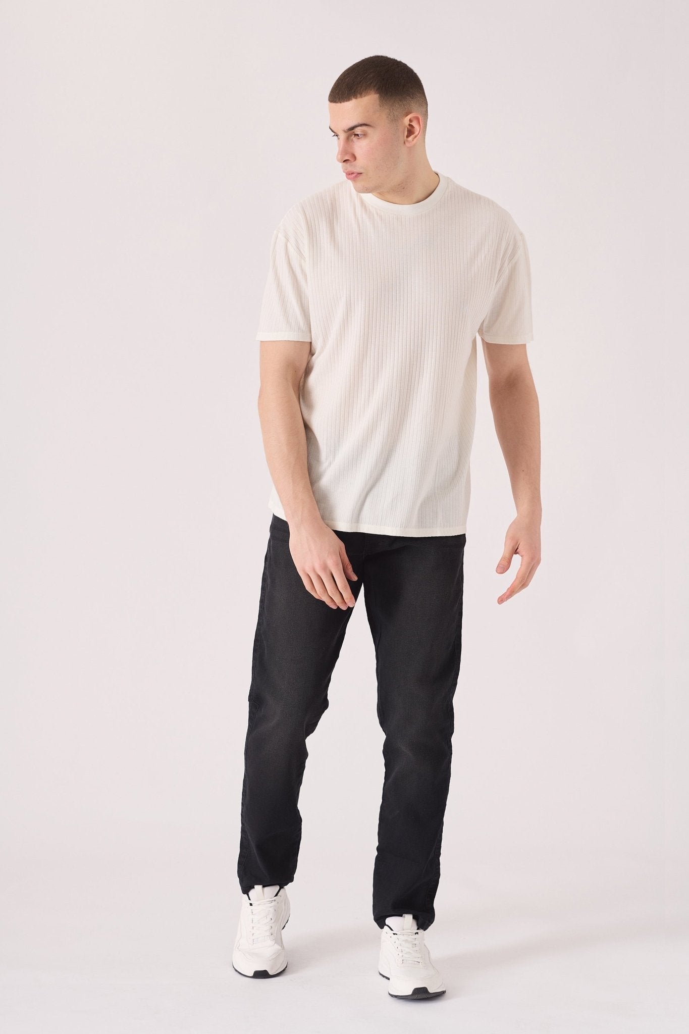black washed jeans slim fit side view full length leg