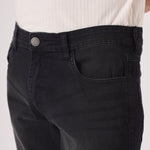 black washed slim fit denim jeans standing pose men