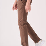 Side full length view of the stretch brown chino trousers.