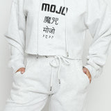 Close up of the printed logo on the grey marl hoodie women's.