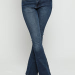 Close up of the flared leg design and mid blue denim wash on these bootcut jeans.