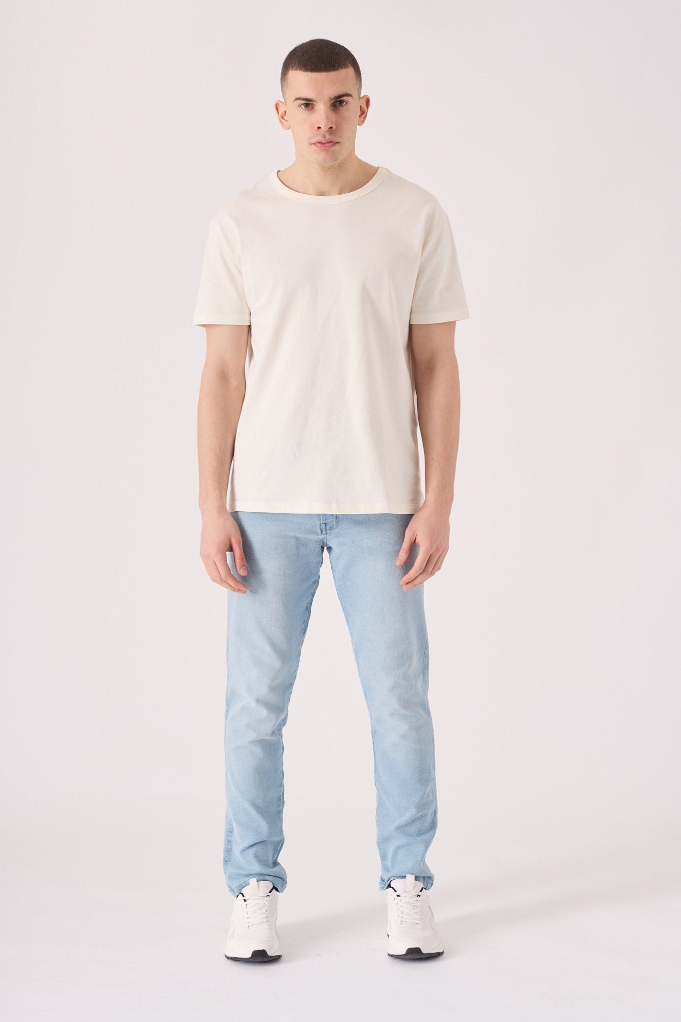 light blue mens jeans slim fit side view full length