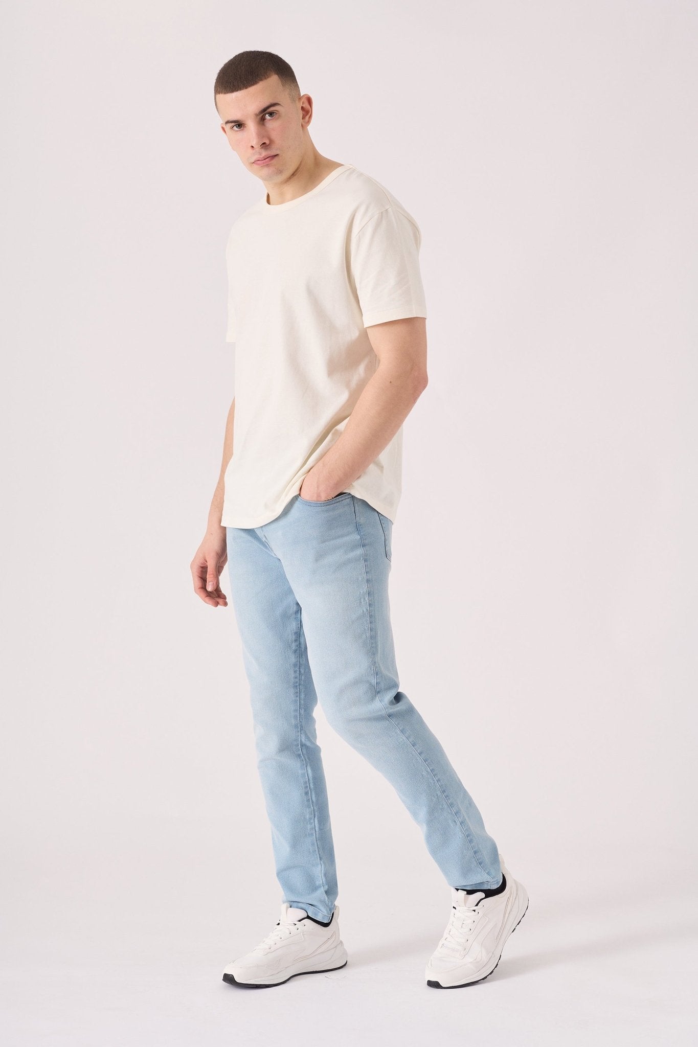 light blue slim fit stretch denim jeans back pocket detail