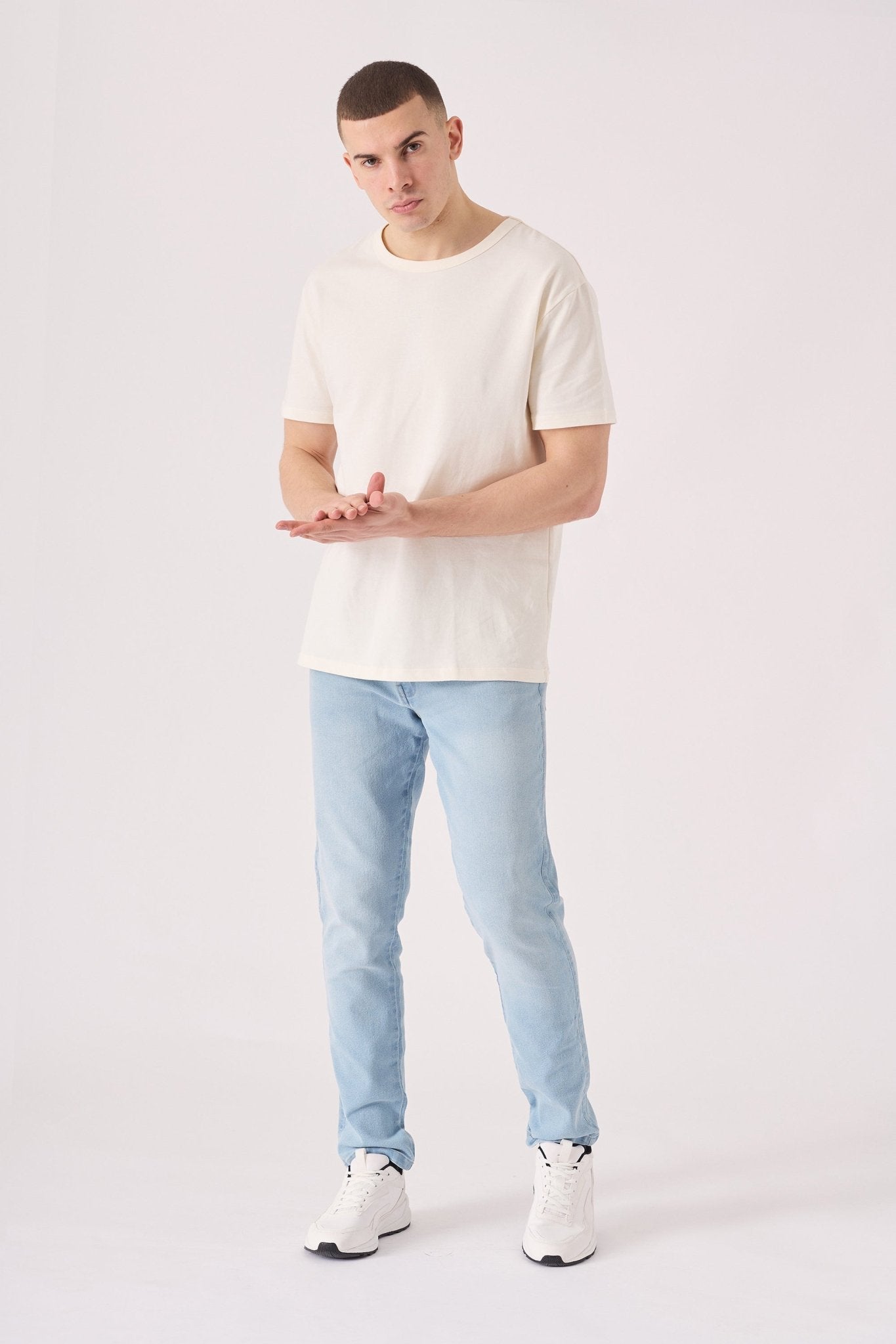 light blue slim fit jeans front view stretch denim