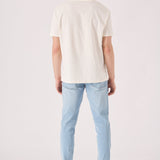 light blue stretch jeans close up stonewash fabric detail