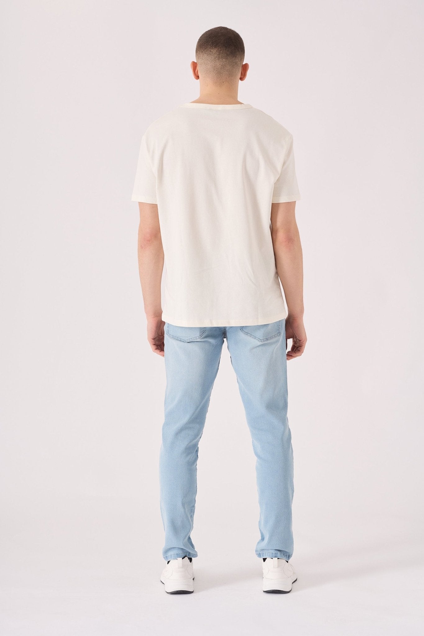 light blue stretch jeans close up stonewash fabric detail