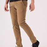 Detailed side view showing the slim fit of the light brown chinos men.