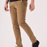 Detailed side view showing the slim fit of the light brown chinos men.