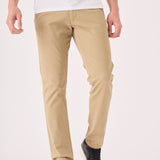 Front shot of the high quality men's beige chinos slim fit from the waist down.