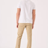Back view showing the clean tailored cut of these men's beige chinos slim fit.