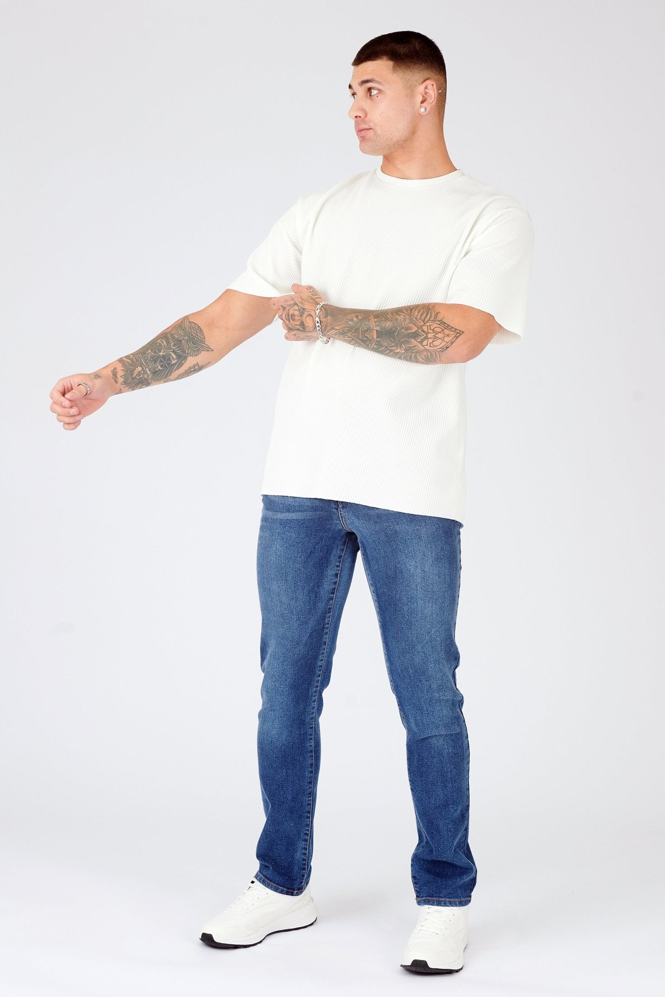 mens mid blue slim fit jeans front view stretch denim