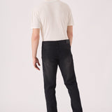 slim fit black washed jeans close up faded fabric detail